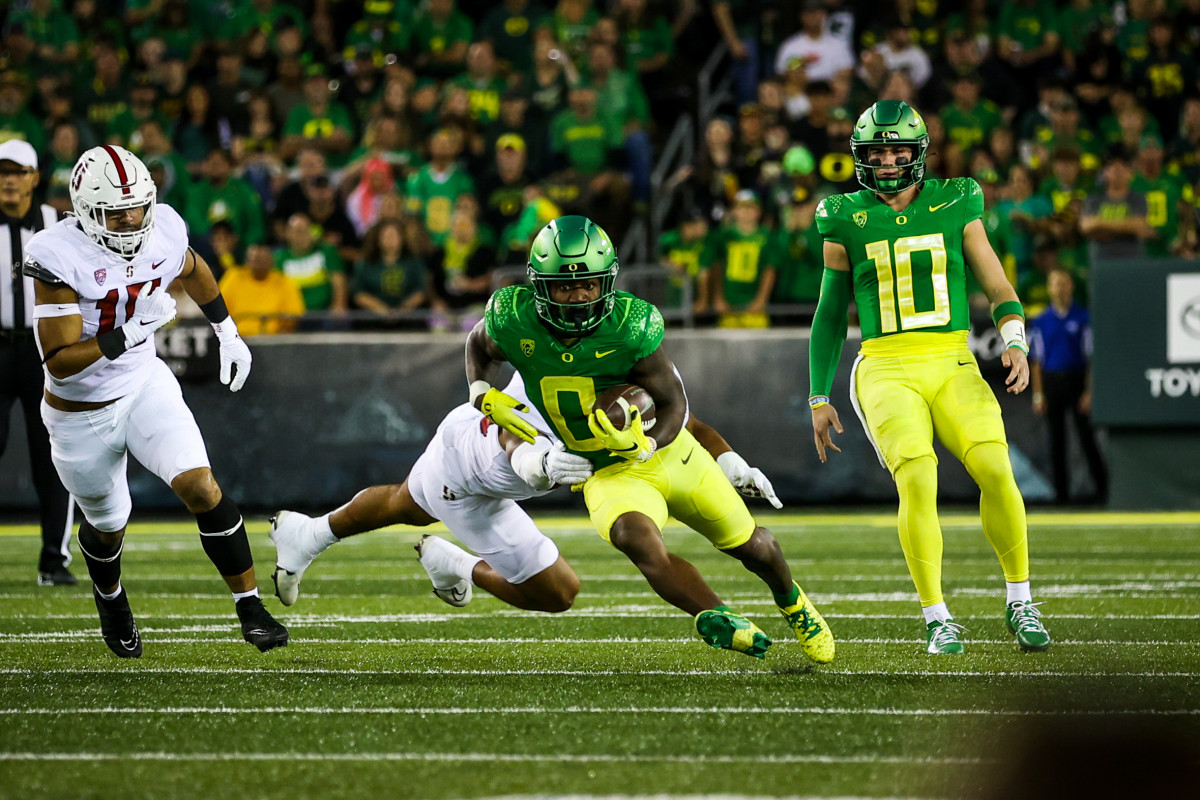 Oregon Ducks running back Mar'Keise 'Bucky' Irving runs the ball against the Stanford Cardinal.